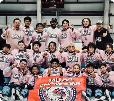 Hockey team celebrating a championship win on the rink